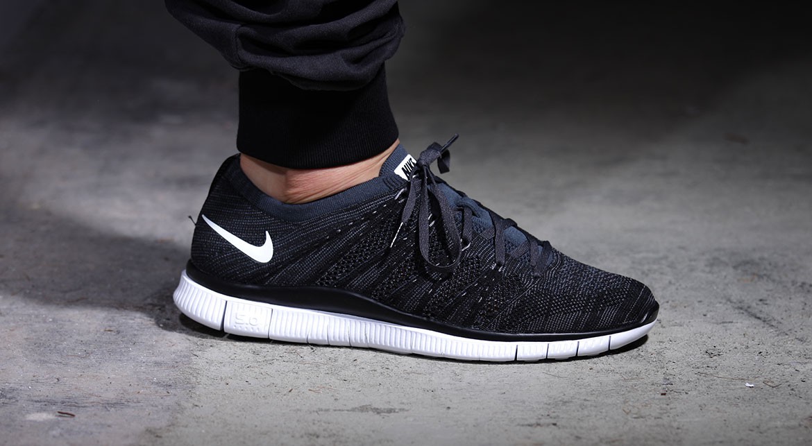 nike free flyknit nsw grey